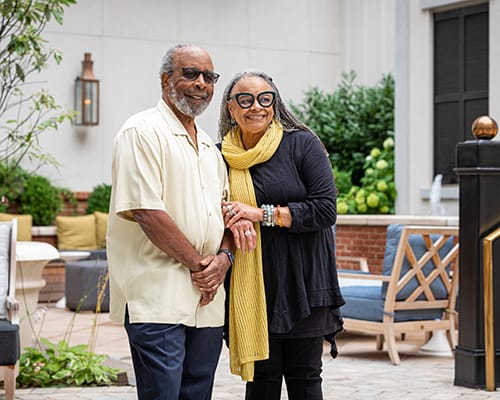 couple standing in courtyard