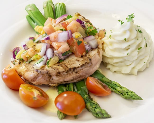 grilled chicken dinner with asparagus and mashed potatoes