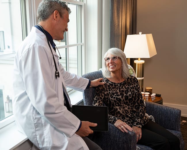 doctor speaking with resident