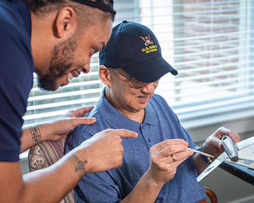 caregiver assisting man