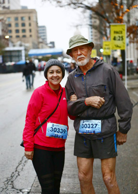 Albert Burrier and his seeing guide at a race