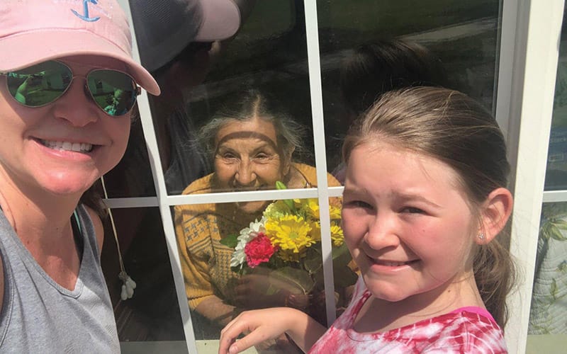  Resident receives flowers from loved ones at Brookdale Sumter (South Carolina).