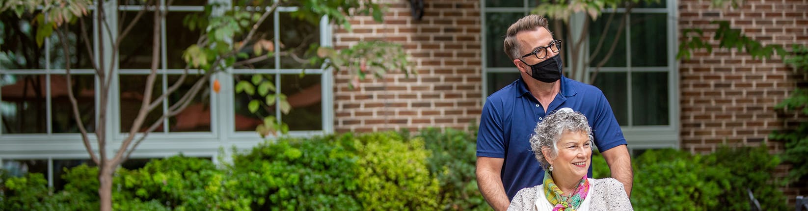 nurse working with woman on therapy bars